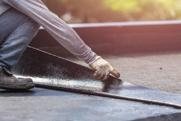 Professional Waterproofing technician working in Richardsville, VA